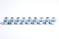 The heads for the wheel locks are in one row on a white background. Royalty Free Stock Photo
