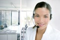 Headset phone business woman dress in white Royalty Free Stock Photo