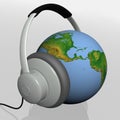 Headset on world globe Royalty Free Stock Photo