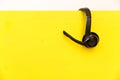 Headset on yellow board, concept for communication, it support, Royalty Free Stock Photo