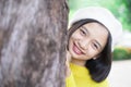 Headshort portrait smile young girl with big tree Royalty Free Stock Photo