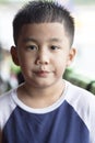 Headshot of asian boy looking with eye contact to camera Royalty Free Stock Photo