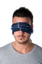 Headshot of blindfolded young man