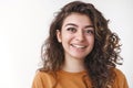 Headshot carefree happy lucky young curly-haired positive caucasian woman laughing smiling having fun enjoying perfect