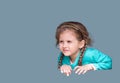 Headshot close up portrait girls with pigtails on their heads, looking into the distance, against a clean background Royalty Free Stock Photo