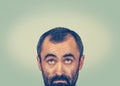 Headshot confused man thinking looking up Royalty Free Stock Photo