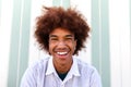 Headshot of happy African American Black young man smiling looking at camera. Summertime. Royalty Free Stock Photo