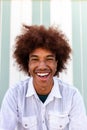 Headshot of happy African American Black young man smiling looking at camera. Summertime. Royalty Free Stock Photo