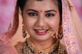 Headshot of happy smiling Indian bridal girl looking at camera during wedding - concept of Wedding Happiness, Bridal Royalty Free Stock Photo
