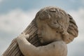 The headshot of an old sculpture of the child in Royal Baths Park, Lazienki Park