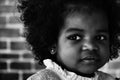 Headshot portrait of african american girl child in black and white Royalty Free Stock Photo