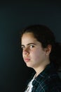 Headshot portrait of defiant teenager