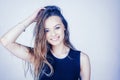 Headshot Portrait of happy girl with beauty face smiling looking at camera. Smiling student girl wearing casual dress. Royalty Free Stock Photo