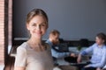 Headshot portrait of happy successful female professional at off