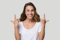 Headshot portrait happy woman pointing fingers up at copy space Royalty Free Stock Photo