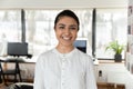 Headshot portrait of indian female employee posing in office Royalty Free Stock Photo