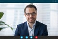 Headshot of businessman talk on video call with client Royalty Free Stock Photo