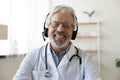 Headshot portrait of smiling senior doctor talk on video call Royalty Free Stock Photo