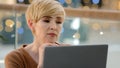 Headshot portrait thoughtful pensive female face doubtful middle-aged adult woman looking away thinking searching idea Royalty Free Stock Photo