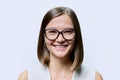 Headshot portrait of young beautiful woman in glasses, on white studio background Royalty Free Stock Photo