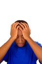 Headshot stressed man wearing strong blue colored t-shirt using hands touching his own head frustrated, white studio