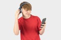 Headshot of a teenage boy listening to music Royalty Free Stock Photo