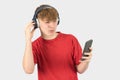 Headshot of a teenage boy listening to music Royalty Free Stock Photo