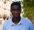 Headshot of african american looking confidently at camera