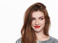 Headshot of young beautiful excited woman with gorgeous natural red hair, red lips, green eyes on white background Royalty Free Stock Photo