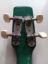 the headstock and back of the ukulele tuner