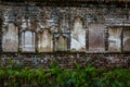 Headstones on brick wall Royalty Free Stock Photo