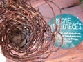 Close-up view of magpie`s nest made of steel wires