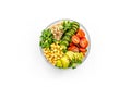 Healhty vegan lunch bowl. Avocado, quinoa, sweet potato, tomato, spinach and chickpeas vegetables salad on white table Royalty Free Stock Photo