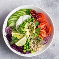 Healhty vegan lunch bowl. Avocado, quinoa, tomato, cucumber, red