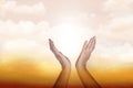 Healing hands in the sky with bright sunburst. Royalty Free Stock Photo