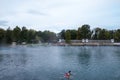 Healing Lake Heviz, Hungary. Autumn. People swiming in the thermal water of lake. There are thermal springs.