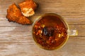 Healing tea from birch mushroom chaga is used in folk medicine. Royalty Free Stock Photo