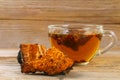 Healing tea from birch mushroom chaga is used in folk medicine.