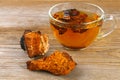 Healing tea from birch mushroom chaga is used in folk medicine.