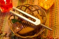 Healing tuning fork and crystal stone on table . Royalty Free Stock Photo