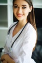 Health and Beauty. Portrait of a Happy Dietitian in the Light Room. Healthy Nutrition. A Doctor with a Beautiful Smile