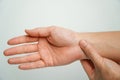 health care concept. Asian man holding his wrist with office syndrome, Pain in the joints of the hands. Carpal tunnel syndrome Royalty Free Stock Photo