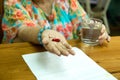 Health care concept fat senior woman hand holding pills with and Royalty Free Stock Photo