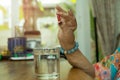 Health care concept fat senior woman hand holding pills with and Royalty Free Stock Photo