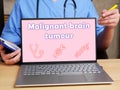 Health care concept meaning Malignant brain tumour with sign on the page