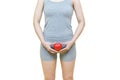 Health care concept - Midsection Of Woman Holding Heart Shape While Standing Against White Background