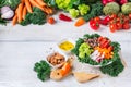 Healthy vegan buddha bowl with kale leaves and raw vegetables Royalty Free Stock Photo