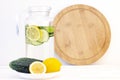 Health care, fitness, healthy eating concept. Fresh cool lemon cucumber drink with water, cocktail, detox drink Royalty Free Stock Photo