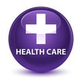 Health care (plus sign) glassy purple round button