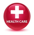 Health care (plus sign) glassy pink round button